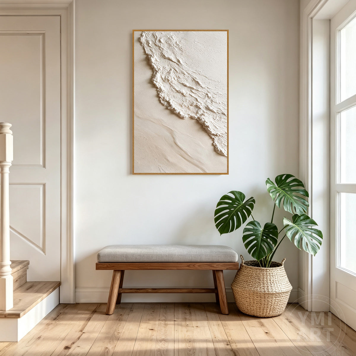 Cream and white textured wall decor in a natural oak wooden frame hanging on a modern minimalist wall.