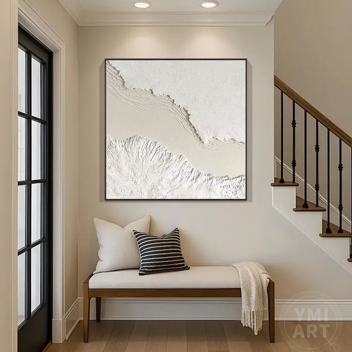Modern monochrome textured wall artwork displayed on a neutral wall under warm spotlighting.
